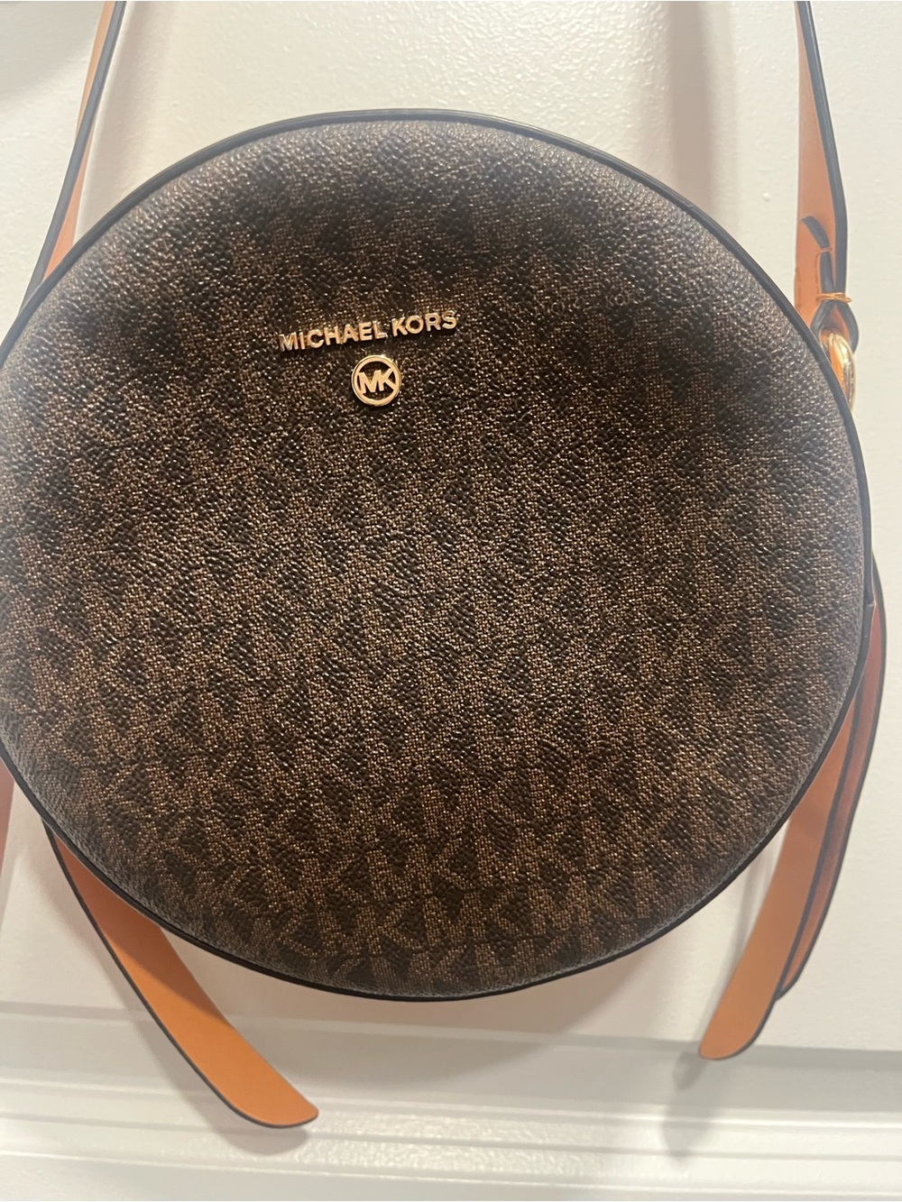 Michael Kors Round Monogram Crossbody in Dark Brown with Tan Strap